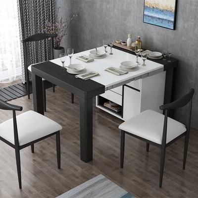 China Elegant minimalist design black and white telescopic folding dining table foldable, expansion mechanism for sale