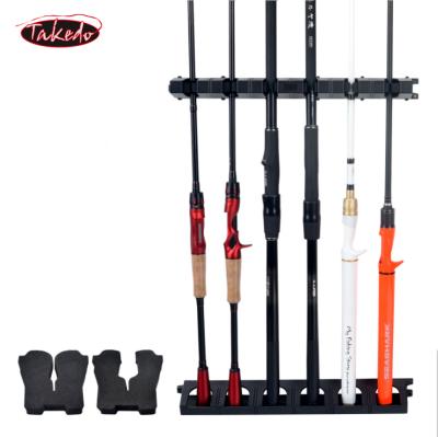 China TAKEDO 6pcs High Quality Plastic Wall Mounted Fishing Tackle Bracket Fishing Rod Bracket Holder Display Rod Holder for sale