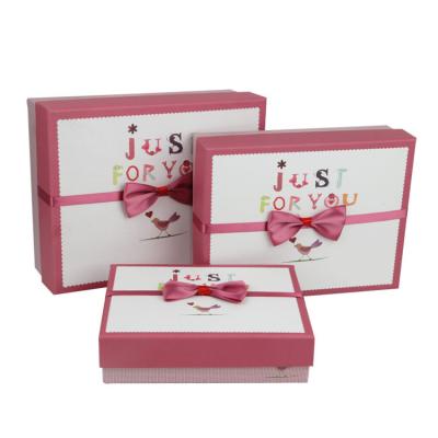 Cina Wholesale Custom Logo Premium Luxury Cardboard Paper Gift Wig Hair Extension Packaging Box with bow in vendita