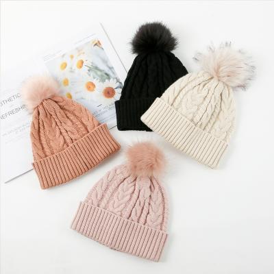 China COMMON Wholesale Winter Beanie Hats Outdoor Acrylic With Big Pompoms Hair Ball Plus Velvet Warm Beanie Hats For Women Headwear for sale