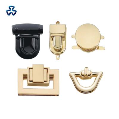 China Custom Bag Purse Fasion Hardware Accessories Spring Clasp Closure Handbag Locks Slotted Bag Push Lock for sale