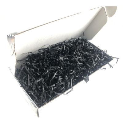 China Moisture Proof Wholesale Black Shredded Paper for sale