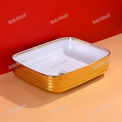 China Modern ChaoZhou Factory Electroplate gold color wash basin ceramic elegant bathroom sink for sale