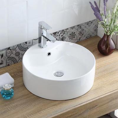 China Modern Chaozhou Factory Wholesale Bathroom Sink round  White color lavatory Ceramic Cheap Price Table Top Wash Basin for sale