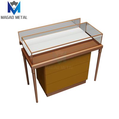 China Customized Modern Scanned Design Direct Selling Stainless Steel Tempered Glass Jewelry Display Table Desktop Jewelry Store Showcase Design for sale