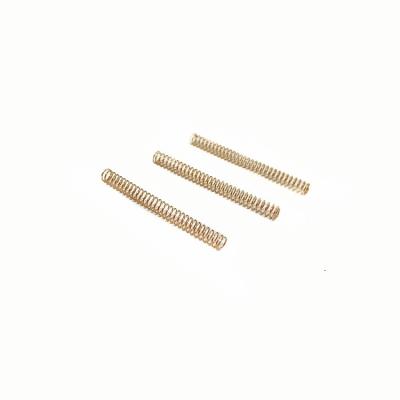 China Small Compression Spring Brass Metal Coil Spring For Toys for sale