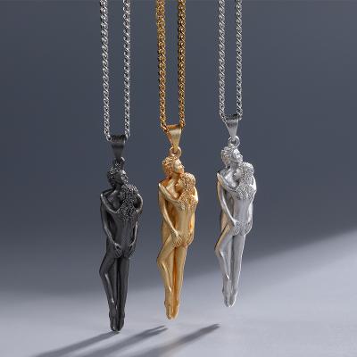 China Hiphop couple gift creative jewelry personality real gold plated necklace pendant couples hug necklace jewelry for sale