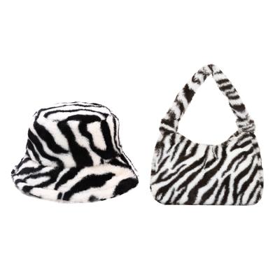 China COMMON zebra print fisherman hat and shoulder bag autumn and winter adjustable warm plush hat women for sale