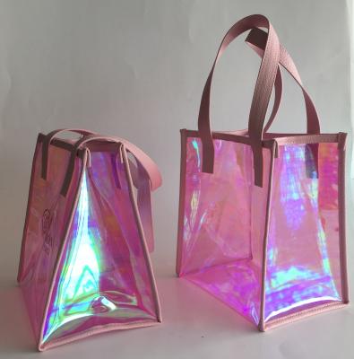 China Clear Fashion Colorful Laser PVC Packaging Fashion Woven Waterproof Cosmetic Transparent Shopping Bag for sale