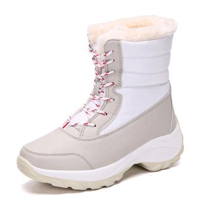 China Winter Ankle Non-slip Waterproof Snow Damping Boots Women With Fur Thick Thigh High Boots for sale