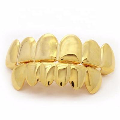 China Hiphop Branclear Popular Hip Hop Bling Real Gold Color Teeth Grillz Top and Bottom Grills High Quality Set Body Jewelry G15 for sale