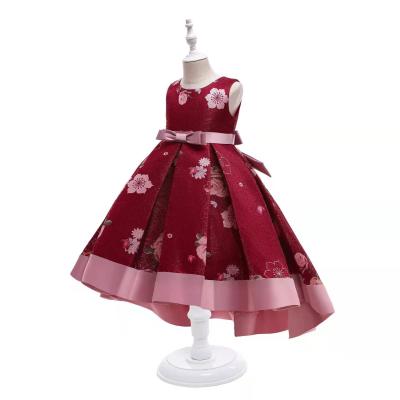 China The washable girl's dress with the large flowered tail for sale