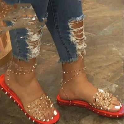 China New 2022 summer style fashion trend women's casual flat shoes strap outdoor sandals with rivets for sale