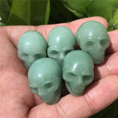 China Europe accept beautiful pink crystal skulls customized natural rose quartz skulls for healing for decoration for sale