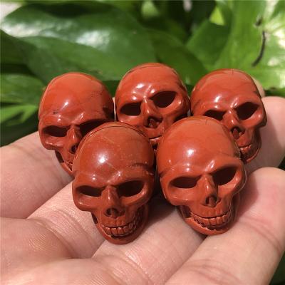 China Europe accept beautiful pink crystal skulls customized natural rose quartz skulls for healing for decoration for sale