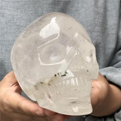 China Wholesale Europe Quartz Skulls Natural Rock Crystal Semi Precious Stone Hand Carved Crystal Statues for sale