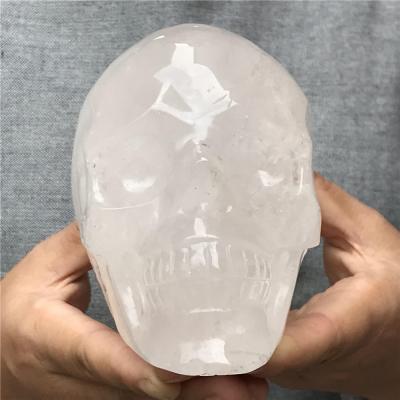 China Wholesale Europe Quartz Skulls Natural Rock Crystal Semi Precious Stone Hand Carved Crystal Statues for sale