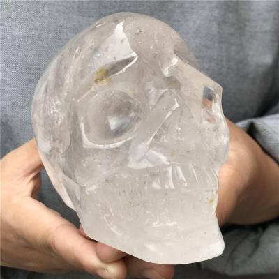 China Wholesale Europe Quartz Skulls Natural Rock Crystal Semi Precious Stone Hand Carved Crystal Statues for sale