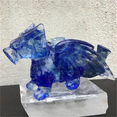 China Europe Crystal Hand Carved Blue Dragon Skulls Cast Stone Rock Carving Sculpture Statue for sale