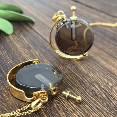 China Europe 2021 Hot Selling Irregular Mini Essential Oil Perfume Bottle Pendant Gemstone Necklaces Mysterious Crystal Diffuser Necklace for sale