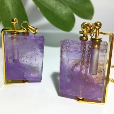 China Europe 2021 Hot Selling Irregular Mini Essential Oil Perfume Bottle Pendant Gemstone Necklaces Mysterious Crystal Diffuser Necklace for sale