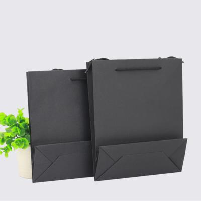 China Recyclable Custom Luxury Garment Gift Paper Shopping Bags With Logo Print for sale