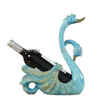 China Wholesale Antique Home Decor Viable Classic Glazed Couple Swans Carve Decoration Resin Craft Swan Wine Racks for sale