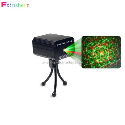 China Multi-mode Voice-activated Laser Lights Stage Light Projector Laser Light for Home Indoor and Outdoor for sale