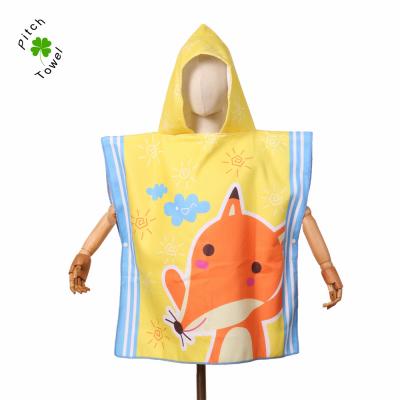 China Viable Printed Cartoon Ponchos Bath Hooded Beach Towel For Kids Children for sale