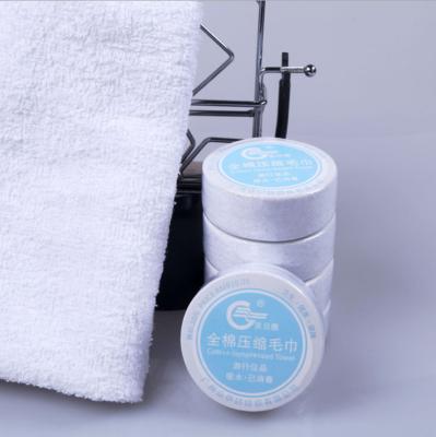 China Essential Travel Compressed 100% Cotton Tablet Tablet Towel Dispenser for sale