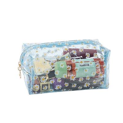 China Fashion Printing Daisy Plant Splash Waterproof Clear PVC Make Up Bag For Cosmetics for sale