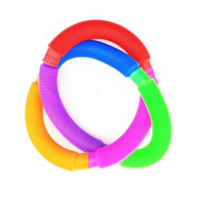 China Toy Plastic Colorful Stress Relief Push Sticky Person Tube Stretch Hose Funny Educational Sensory DIY Toys for sale