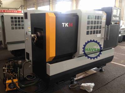 China Universal Metal CNC Gap Bed Lathe Machine with 2 - controllable axes for sale