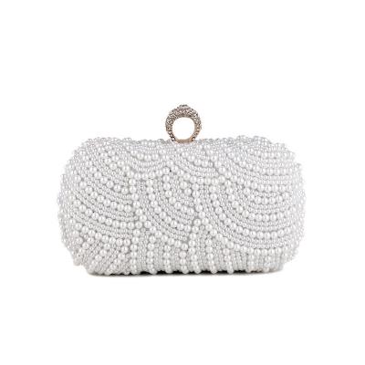 China Durable Women Pearls Beaded Clutch Light Luxury Wedding Pearls Purse Evening Handbag With Floral Texture for sale