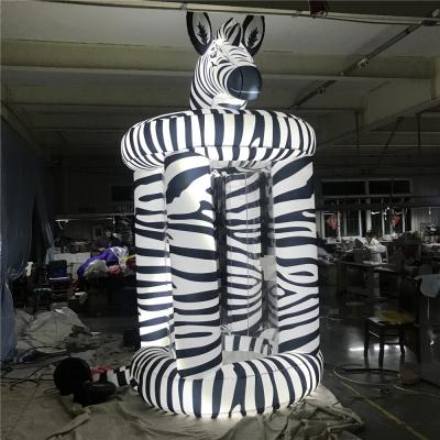 China Decoration Zebra Shape Inflatable Silver Booth Grab Machine For Trade Promotion for sale