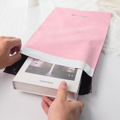 China Eco-friendly Custom Personalised  Pink Waterproof Packaging Poly Mailer Postage Bag Clothing Package Mailing Bags  For Clothes for sale