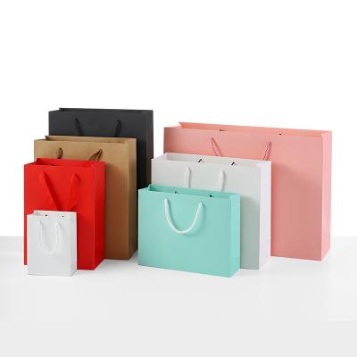 China Handmade Custom Logo Recyclable Kraft Paper Bag With Twisted Handle Shopping Reusable Paper Bags Eco Friendly for sale