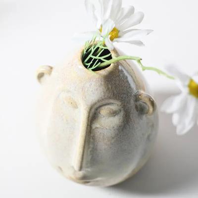 China Modern Light Luxury Ceramic Vase Ornaments Retro Face Flower Household Accessories Living Room Soft Decorations for sale