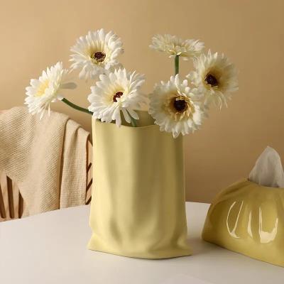 China Modern Creative Kraft Paper Bag Shape Vase Cream Style Ceramic Vases Home Living Room Porch Decoration Tabletop Flower V for sale