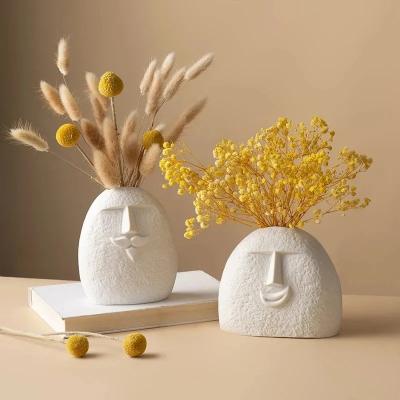 China Decorative Abstract Art Living Room Home Decor Plant Pots Creative White Human Face Ceramic Porcelain Flower Vase for sale