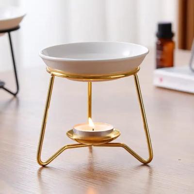 China Creative Aromatherapy Stove Essential Oil Lamp Household Tealight Holder Iron Oil Burner Scented Wax Melting Stove Diffu for sale