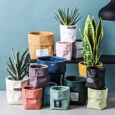 China Kraft Paper Bag Shape Ceramic Plant Pots Ceramic Outdoor Nordic Style Colorful Ceramic Succulent Planter Pots for Indoor for sale