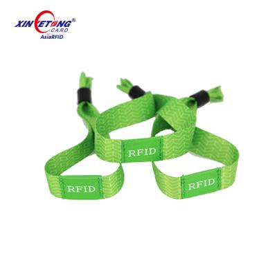 China 2022 Festival Events Waterproof / Waterproof Cloth Custom RFID Woven Wristband For Cashless Payment for sale