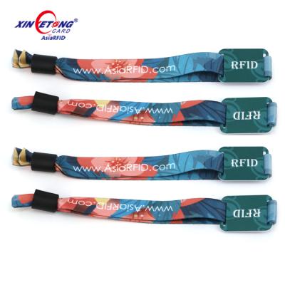 China Waterproof / woven waterproof RFID / fabric wristband for concert festival one time use long term disposable rfid wristband for sale