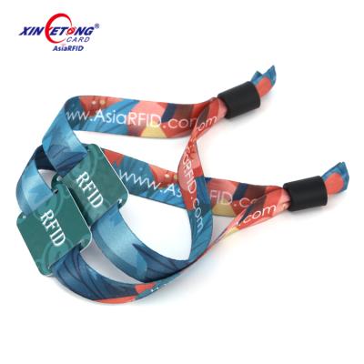 China Customized 13.56MHz EV1 RFID Woven Fabric NFC Waterproof / Waterproof Printing Ultralight Wristband For Water Park for sale