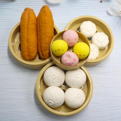 China Huayi Interesting Children's Games Kitchen Tableware Simulation Food Breakfast Squeeze Toy Bread Steamed Stuffed Bun TPR Squeeze Educational Toy for sale