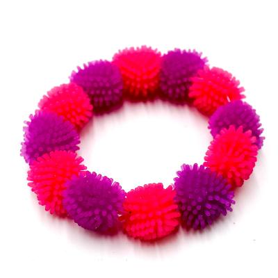 China Eco-Friendly TPR Wristband Busy Person Sensory Toy for Students, Adults and Children Desktop Soothing Toy for sale