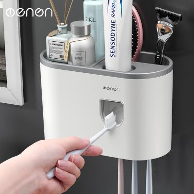 China Contemporary factory outlet selling new multifunctional hole free toothpaste squeezing tool with cup toothbrush shelf for sale