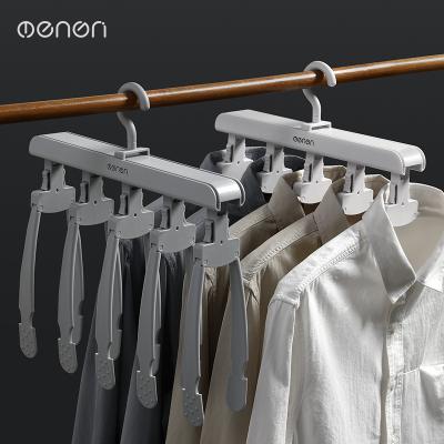 China Modern Multifunctional folding rotary clothes storage rack for hotel tourism for sale