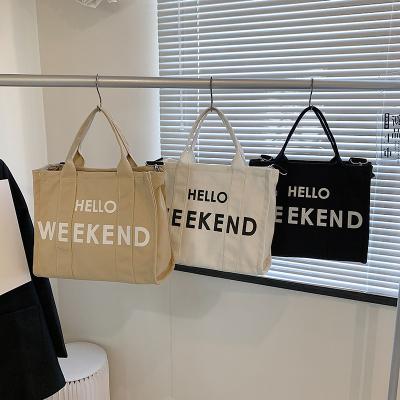 China High Quality Hot Sale Lady New Fashion White 13'' Good Stitching Canvas Bag Shopping Tote Bag Cotton Bags with Print Logo for sale